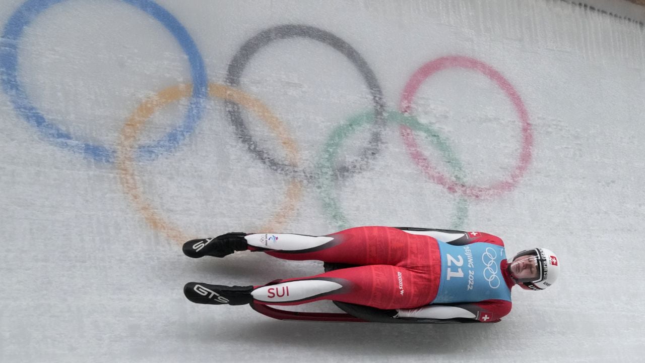 Natalie Maag of Switzerland takes a practice run during the women's singles luge training at the 2022 Winter Olympics, Thursday, Feb. 3, 2022, in the Yanqing district of Beijing. (AP/Dmitri Lovetsky)
