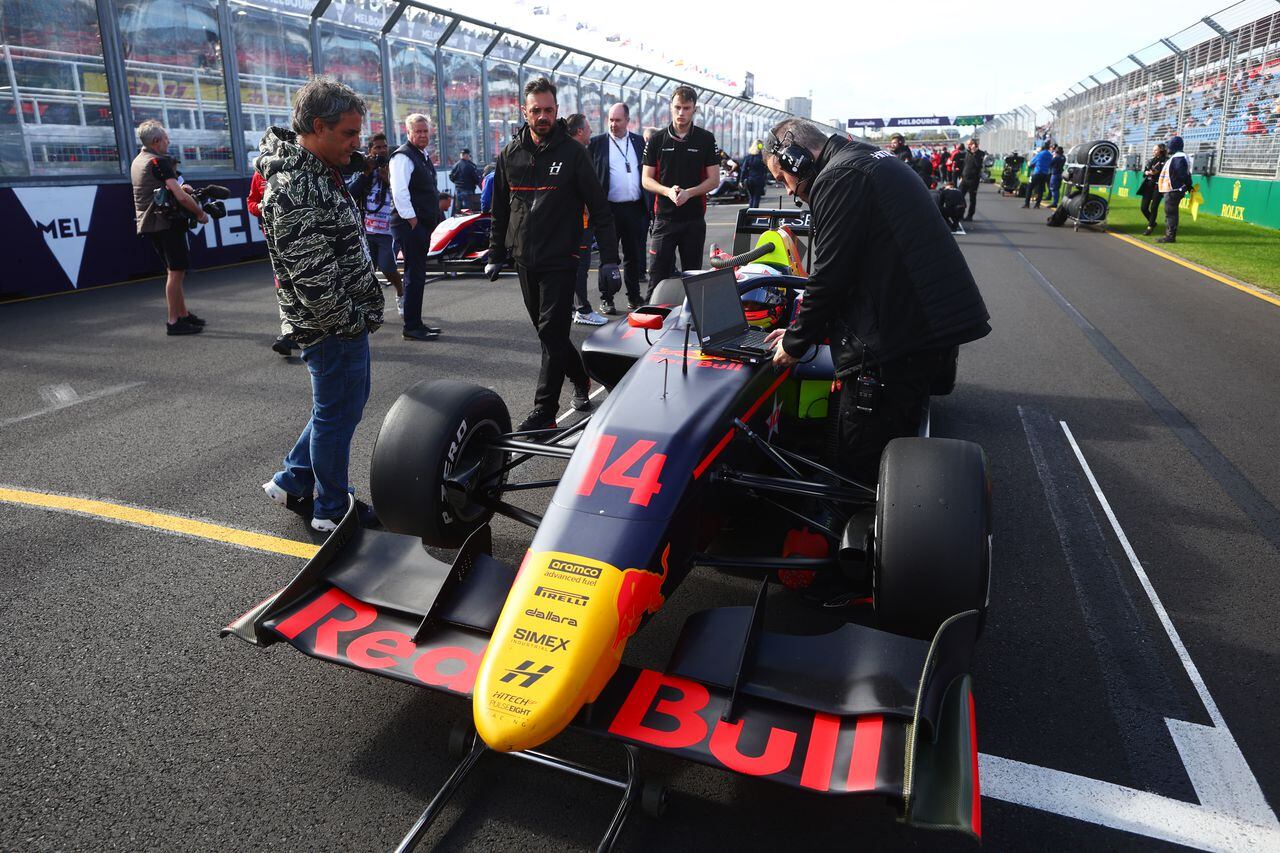 MELBOURNE, AUSTRALIA - APRIL 01: Sebastian Montoya of Colombia and Hitech Pulse-Eight (14) prepares to drive as his father Juan Pablo Montoya looks on, on the grid during the Round 2:Melbourne Sprint race of the Formula 3 Championship at Albert Park Grand Prix Circuit on April 01, 2023 in Melbourne, Australia. (Photo by Bryn Lennon - Formula 1/Formula Motorsport Limited via Getty Images)