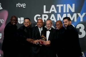 SEVILLE, ANDALUSIA, SPAIN - NOVEMBER 16: Grupo Niche and Orquesta Sinfonica Nacional de Colombia, pose with the Grammy for best salsa album, which was awarded during the Latin Grammy 2023 gala awards ceremony, at the Palacio de Congresos de Sevilla, on 16 November, 2023 in Seville, Andalusia, Spain. Seville today hosted the 24th edition of the Latin Grammy Awards, which recognize artistic and technical excellence in Ibero-American music. This is the first time since 2000 that the Latin Grammy Awards have been held outside the United States and also the first time that the awards ceremony has been broadcast internationally. The gala could be followed on La 1 and RTVE Play. (Photo By Joaquin P. Reina/Europa Press via Getty Images)