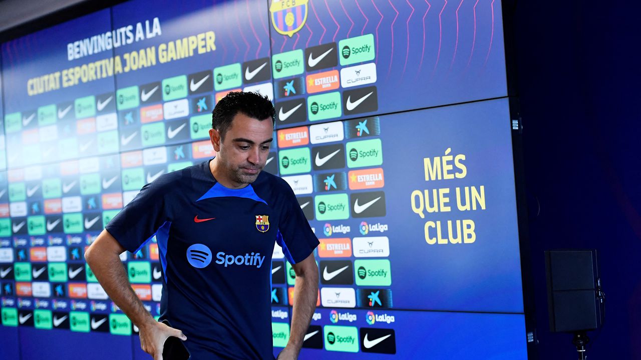FC Barcelona's Spanish coach Xavi leaves after addressing a press conference on the eve of their Spanish League football match against Real Madrid at the Joan Gamper training ground in Sant Joan Despi, near Barcelona on October 15, 2022. (Photo by Pau BARRENA / AFP)