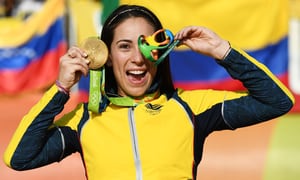 RIO DE JANEIRO, BRAZIL - AUGUST 19: Mariana Pajon of Colombia celebrates with the gold after winning the Women's BMX Final on day 14 of the Rio 2016 Olympic Games at the Olympic BMX Centre on August 19, 2016 in Rio de Janeiro, Brazil. (Photo by David Ramos/Getty Images)