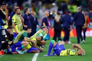 Soccer Football - FIFA World Cup Qatar 2022 - Quarter Final - Croatia v Brazil - Education City Stadium, Doha, Qatar - December 9, 2022 Brazil's Richarlison and teammates look dejected after being eliminated from the World Cup REUTERS/Matthew Childs