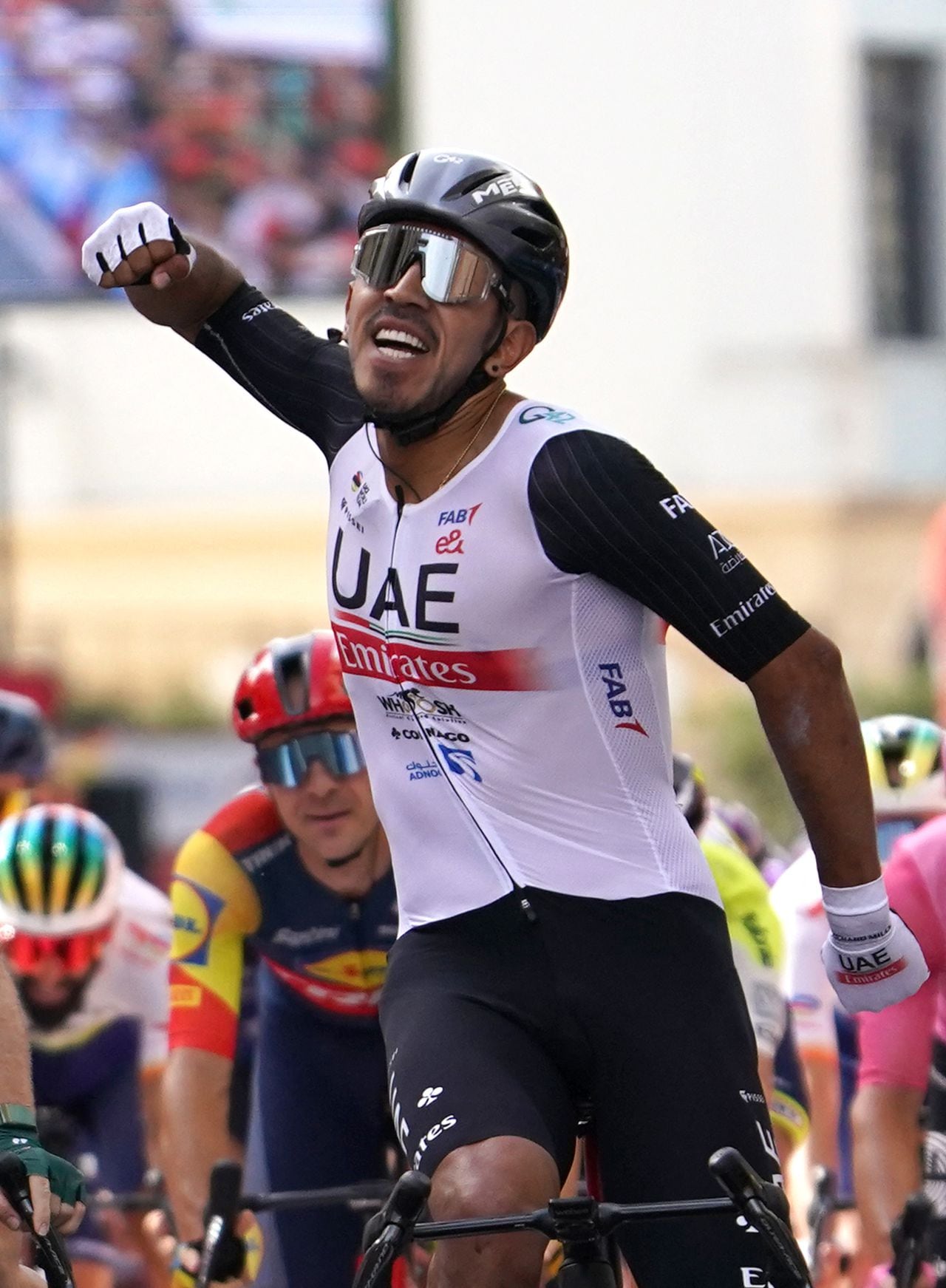 Team UAE Emirates' Columbian rider Sebastian Molano celebrates after winning the stage 12 of the 2023 La Vuelta cycling tour of Spain, a 150,6 km race between Olvega and Zaragoza, on September 7, 2023. (Photo by CESAR MANSO / AFP)