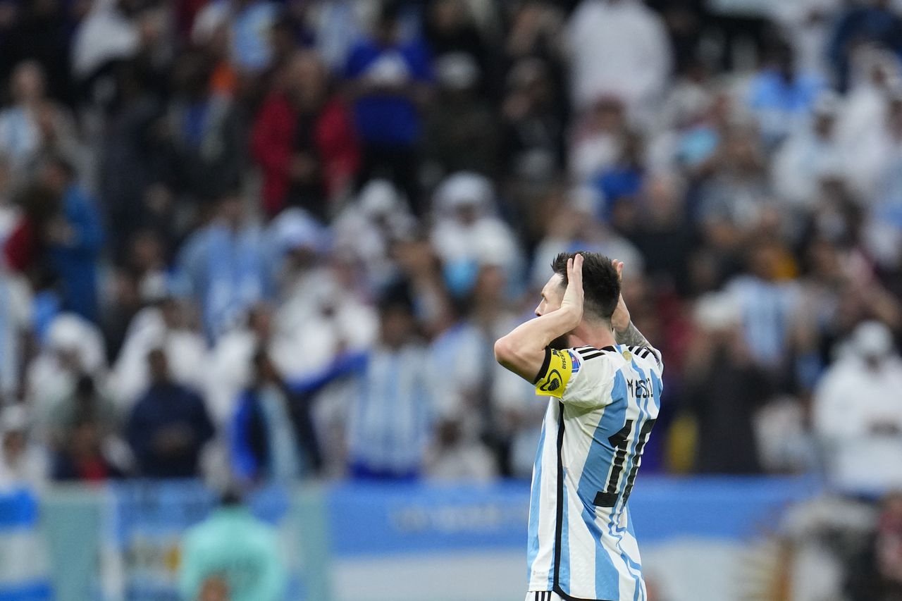 Argentina's Lionel Messi celebrates after scoring his side's second goal from a penalty kick during the World Cup quarterfinal soccer match between the Netherlands and Argentina, at the Lusail Stadium in Lusail, Qatar, Friday, Dec. 9, 2022. (AP Photo/Natacha Pisarenko)