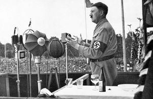Adolf Hitler delivering a speech to the German people during the Party Congress of the NSDAP in Nuremberg, 1935, Weimar Republic. (Photo by: Photo12/Universal Images Group via Getty Images)