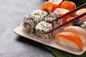Sushi and maki set on stone table