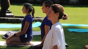 Participantes de Yoga al Parque Reebok y Fucsia