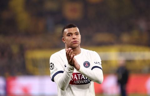 Paris Saint-Germain's French forward #07 Kylian Mbappe reacts after the UEFA Champions League group F football match between BVB Borussia Dortmund and Paris Saint-Germain in Dortmund, western Germany, on December 13, 2023. (Photo by FRANCK FIFE / AFP)