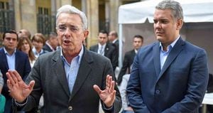 El senador Álvaro Uribe Vélez y el candidato presidencial del Centro Democrático Iván Duque. AFP
