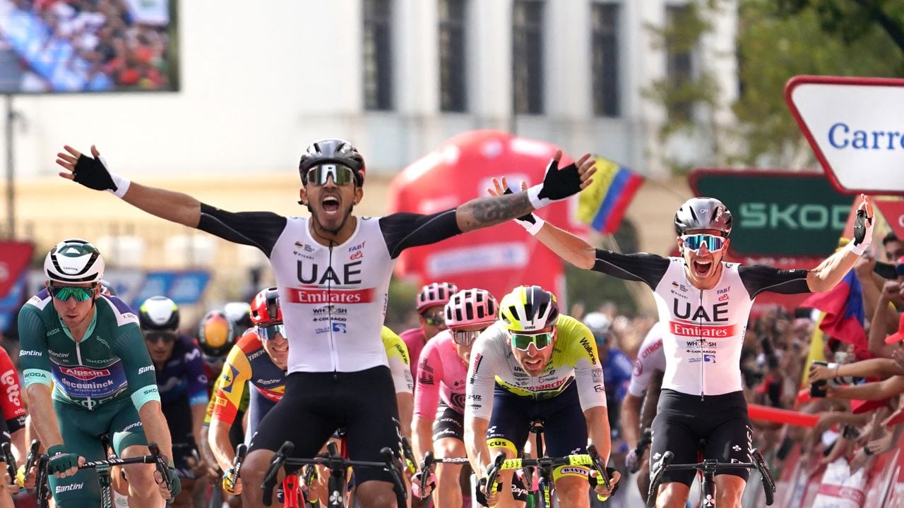 Team UAE Emirates' Columbian rider Sebastian Molano celebrates next to Team UAE Team Emirates' Portuguese rider Rui Oliveira (R) after winning the stage 12 of the 2023 La Vuelta cycling tour of Spain, a 150,6 km race between Olvega and Zaragoza, on September 7, 2023. (Photo by CESAR MANSO / AFP)
