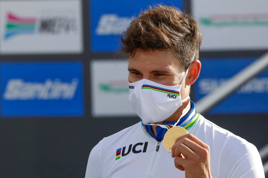 Italy's Filippo Ganna shows his gold medal of the men's Individual Time Trial event, at the road cycling World Championships, in Imola, Italy, Friday, Sept. 25, 2020. (AP Photo/Andrew Medichini)