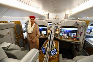 A flight attendant can be seen inside the first class cabin inside an Airbus A380 at the airbus factories in Hamburg, Germany, 3 November 2017. An official ceremony will see the 100th airbus A380 delivered to the airline Emirates from Dubai. Emirates is one of the largest clients for the Airbus A380. Photo: Christian Charisius/dpa (Photo by Christian Charisius/picture alliance via Getty Images)