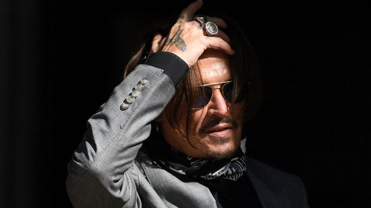 (FILES) In this file photo taken on July 28, 2020 US actor Johnny Depp arrives to attend the final day of his libel trial against News Group Newspapers (NGN), at the High Court in London. - A UK court on March 25, 2021, refused Hollywood superstar Johnny Depp the right to appeal a ruling that upheld claims in a newspaper article that he beat his ex-wife Amber Heard. (Photo by DANIEL LEAL-OLIVAS / AFP)