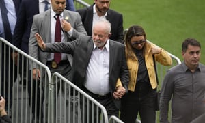 Brazil President Luiz Inacio Lula da Silva leaves the Vila Belmiro stadium in Santos, Brazil, after attending the wake of Brazil soccer great Pele on Tuesday, Jan. 3, 2023. (AP Photo/Andre Penner)
