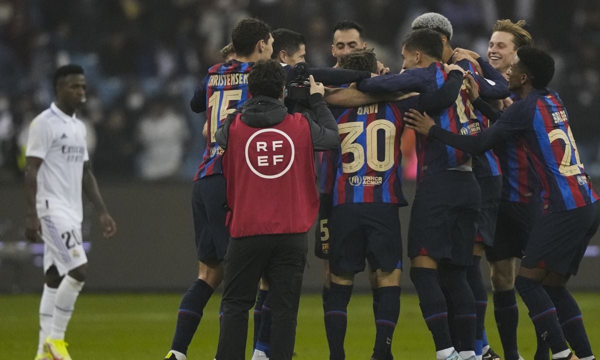 Barcelona players celebrate after they won the final of the Spanish Super Cup between Barcelona and Real Madrid in Riyadh, Saudi Arabia, Sunday, Jan. 16, 2023. (AP/Hussein Malla)