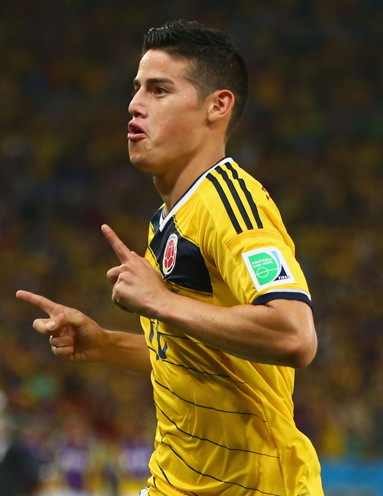 RIO DE JANEIRO, BRAZIL - JUNE 28:  James Rodriguez of Colombia celebrates scoring his team's first goal during the 2014 FIFA World Cup Brazil round of 16 match between Colombia and Uruguay at Maracana on June 28, 2014 in Rio de Janeiro, Brazil.  (Photo by Jamie Squire/Getty Images)